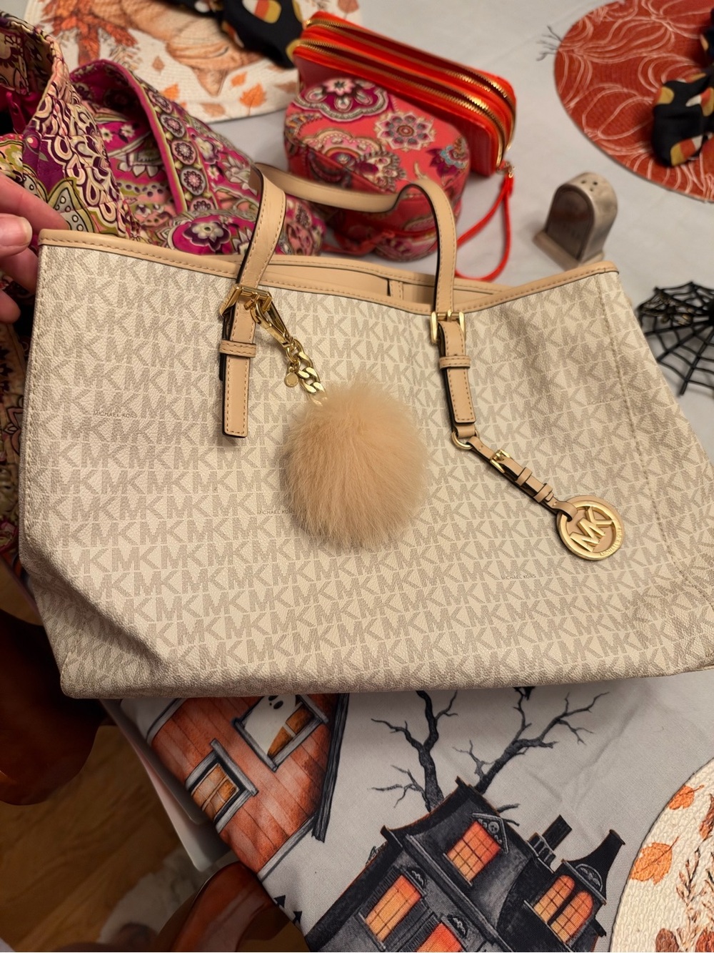 Michael Kors Ivory Signature MK Tote with Gold Charm and Pom-Pom